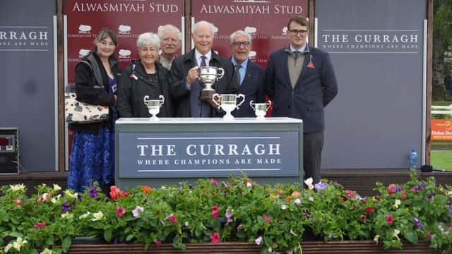 team-valor-irwin-hold-trophy